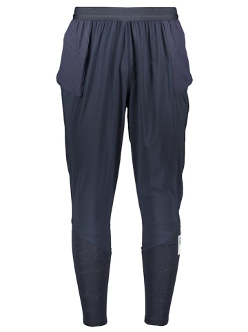 Puma Spodnie dresowe "Run First Mile Jogger Parisian" w kolorze granatowym