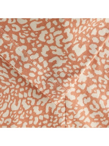 Noppies Uitlopende leggings oranje/crème