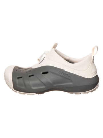 Crocs Slippersy "Quick Trail" w kolorze kremowym