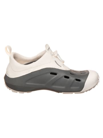 Crocs Slippersy "Quick Trail" w kolorze kremowym