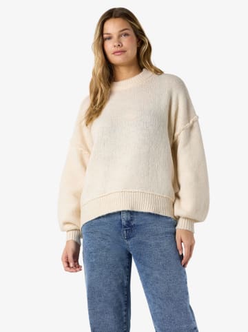 Sweter w kolorze beżowym