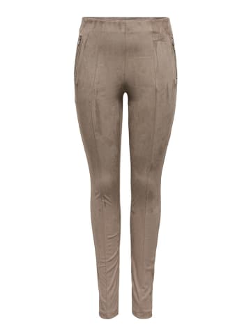 Legginsy w kolorze beżowym