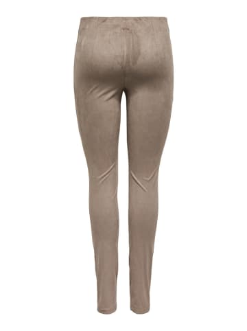 Legginsy w kolorze beżowym