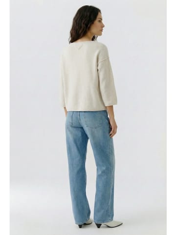 Sweter w kolorze kremowym