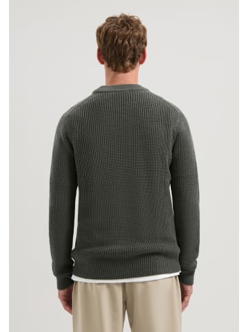 Sweter w kolorze ciemnozielonym