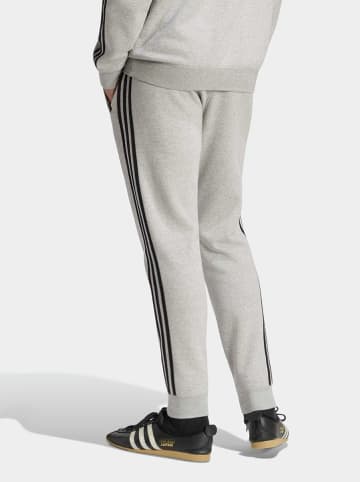 adidas Spodnie dresowe w kolorze szarym