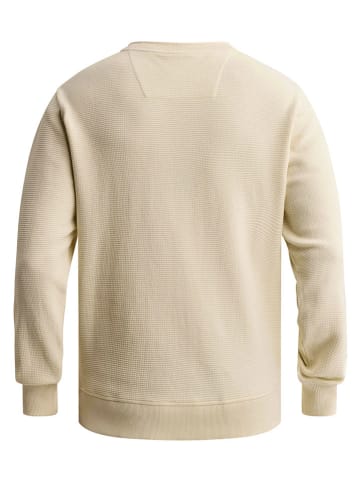 Sweter w kolorze beżowym