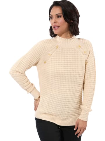 Sweter w kolorze beżowym