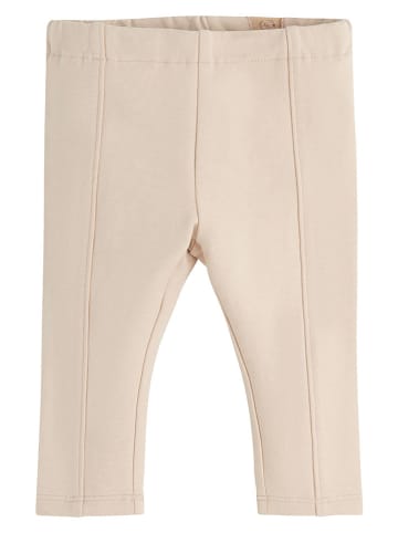 Legginsy w kolorze beżowym