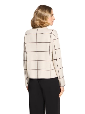 Sweter w kolorze kremowym