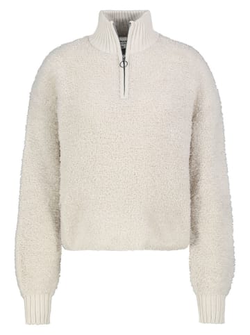 Sweter w kolorze beżowym