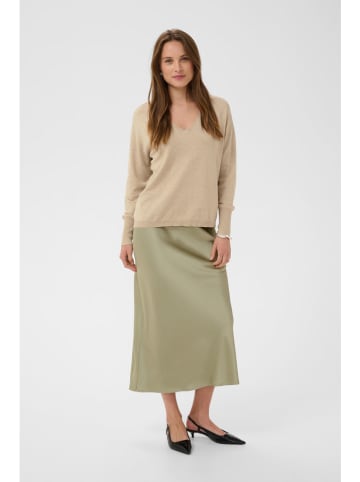 Sweter w kolorze beżowym
