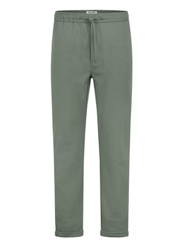 Spodnie chino w kolorze zielonym