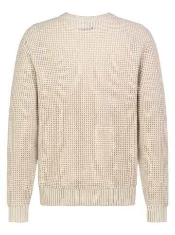 Sweter w kolorze beżowym