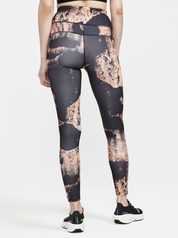 Legginsy "ADV Essence" w kolorze pomarańczowo-czarnym do biegania