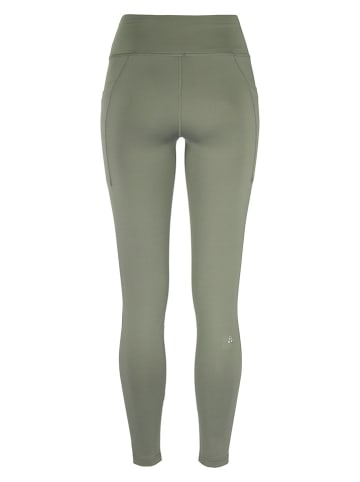 Legginsy "Adv Essence Warm Wind" w kolorze zielonym