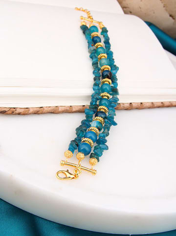 Vergulde armband met edelstenen