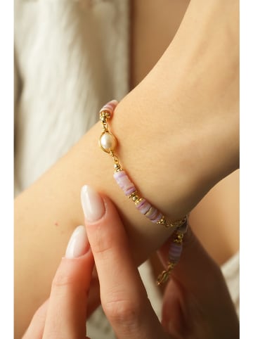 Vergulde armband met edelstenen en parels