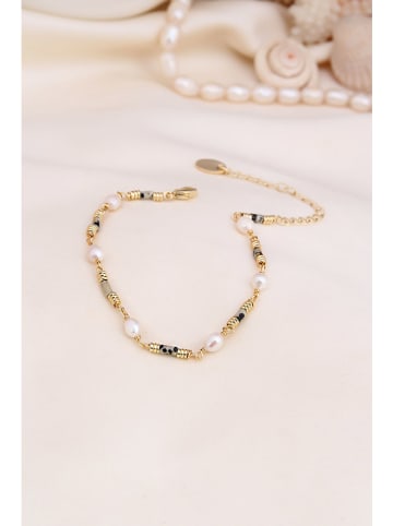 Vergulde armband met edelstenen en parels