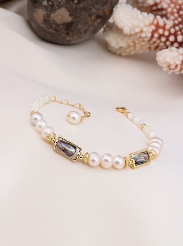 Vergulde armband met edelstenen en parels