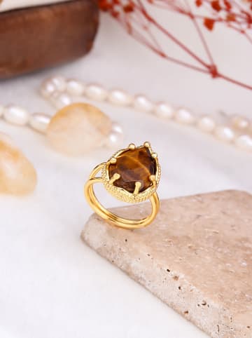 Vergulde ring met edelsteen