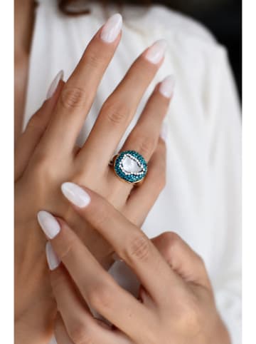 Vergulde ring met edelstenen
