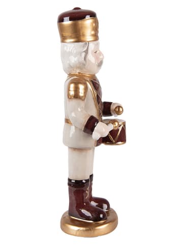 Figurka dekoracyjna "Nutcracker" w kolorze złoto-kremowym - 8 x 25 x 8 cm