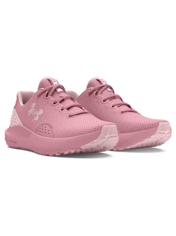 Buty "Charged Surge 4" w kolorze różowym do biegania