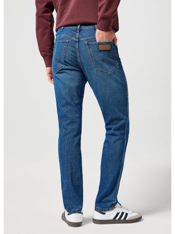 Dżinsy - Tapered fit - w kolorze niebieskim