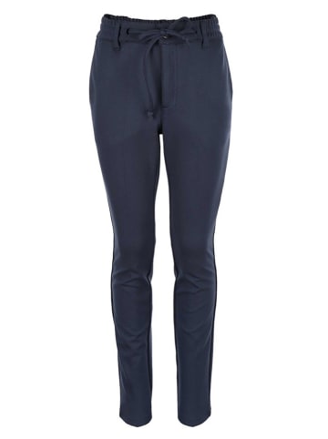 Spodnie dresowe - Slim fit - w kolorze granatowym
