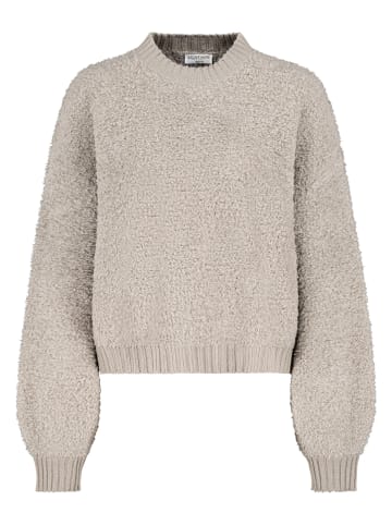 Sweter w kolorze beżowym