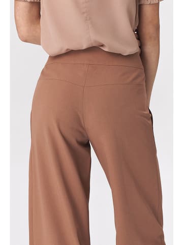 Nife Spodnie w kolorze jasnobrązowym
