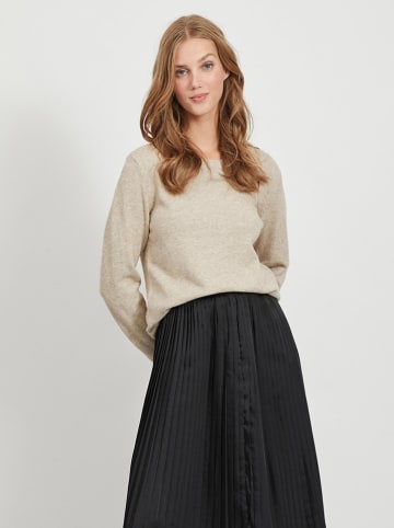 Sweter w kolorze beżowym