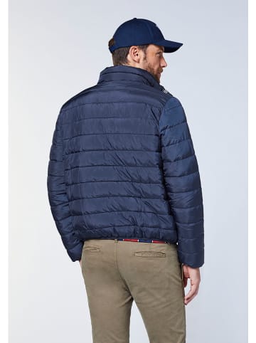 Doorgestikte jas donkerblauw