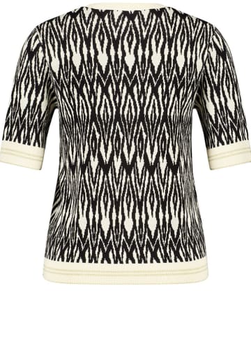 Sweter w kolorze czarno-kremowym