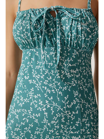 Kleid in Petrol/ Weiß