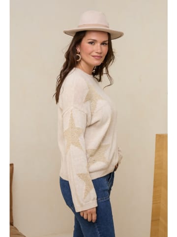 Sweter w kolorze beżowym