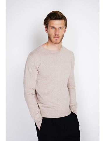 Sweter w kolorze beżowym