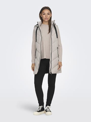Doorgestikte bodywarmer crème