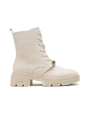 Boots in Creme
