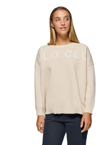 Sweter w kolorze beżowym