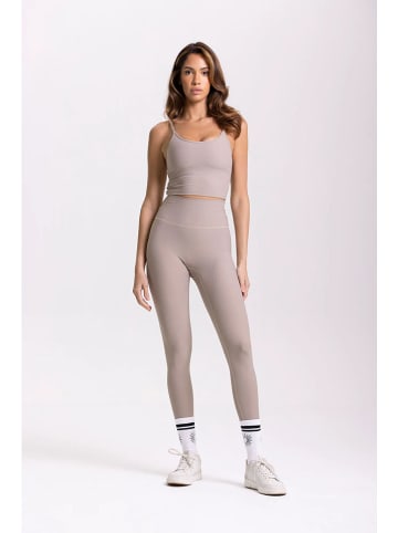 Legginsy sportowe "Lotus" w kolorze szarobrązowym