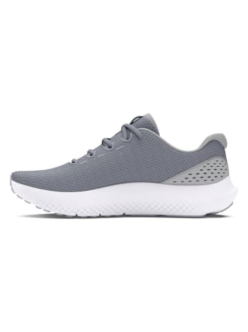 Buty "Charged Surge 4" w kolorze szarym do biegania