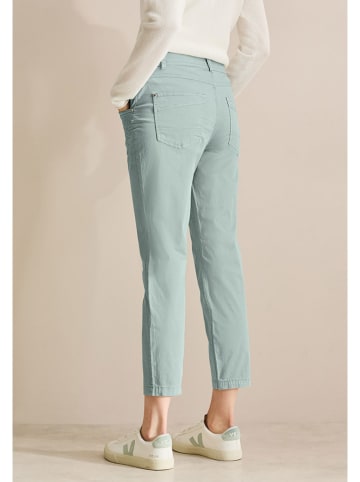 Spodnie - Slim fit - w kolorze turkusowym