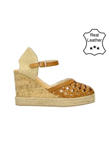 Leren sleehakslingpumps cognackleurig