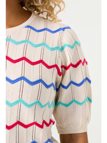 Sweter w kolorze kremowym