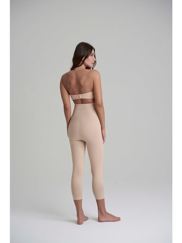 Legginsy modelujące w kolorze beżowym