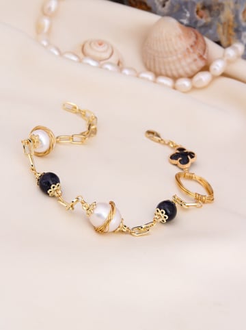 Vergulde armband met edelstenen en parels