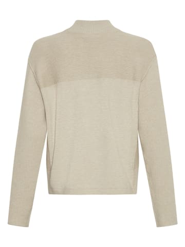 Sweter w kolorze beżowym