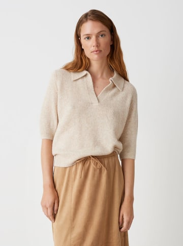 Sweter w kolorze beżowym